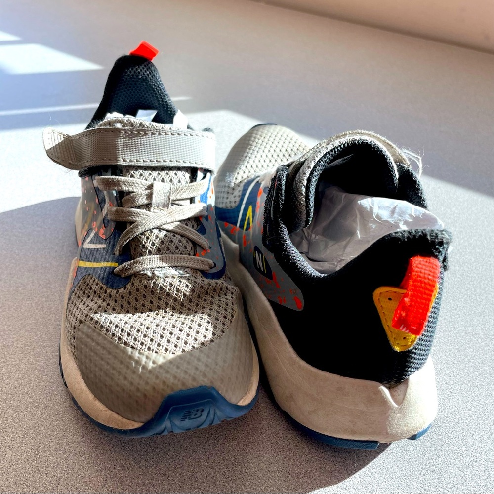 New Balance kids Velcro sneakers size 2. Used but in solid condition.